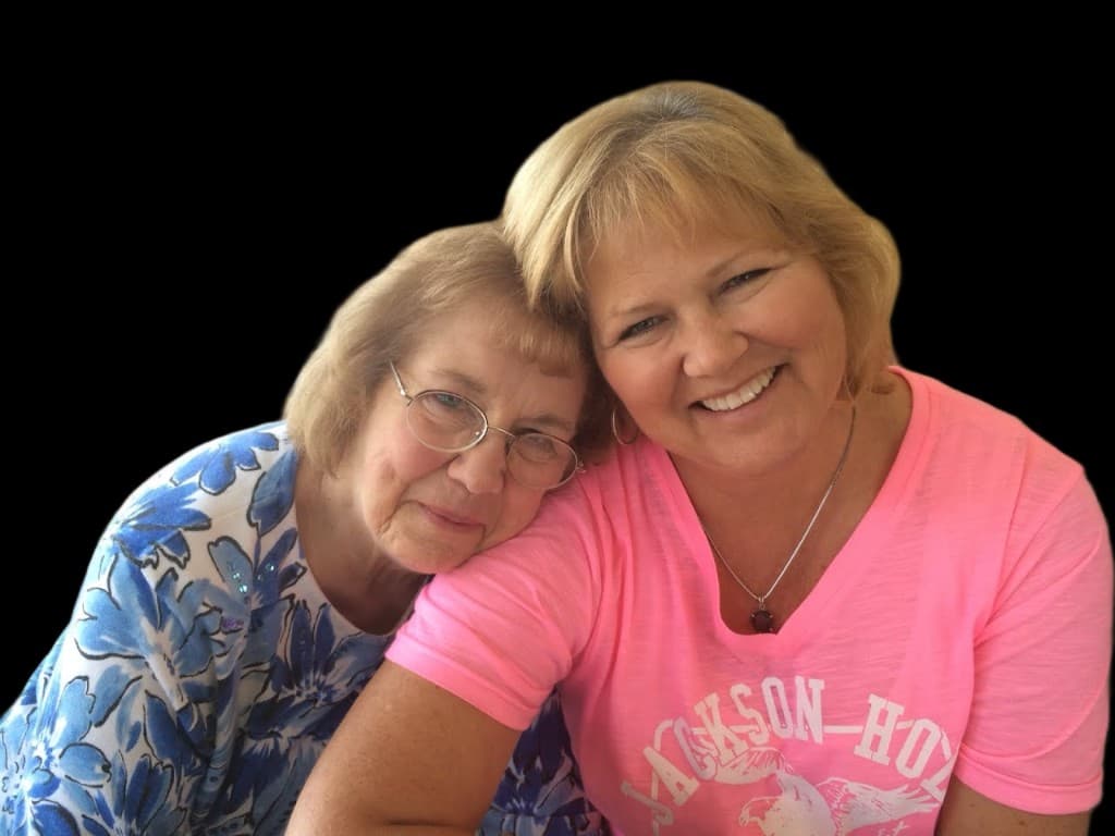 Mother and daughter sharing a loving embrace